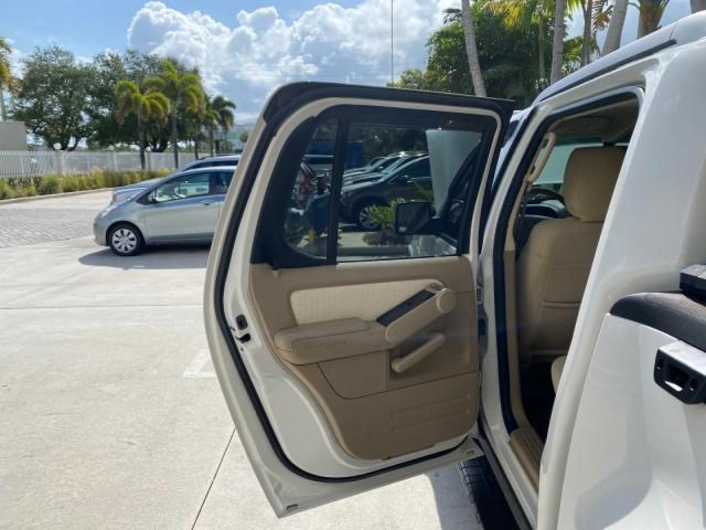 2009 White Suede /Camel Ford Explorer Sport Trac XLT LOW MILES 73,848 (1FMEU31E99U) with an 4.0L SOHC 12-Valve V6 Engine engine, Automatic transmission, located at 4701 North Dixie Hwy, Pompano Beach, FL, 33064, (954) 422-2889, 26.240938, -80.123474 - OUR WEBPAGE FLORIDACARS1.COM HAS OVER 100 PHOTOS AND FREE CARFAX LINK 2009 Ford Explorer Sport Trac XLT Sport Pickup 4.0L V6 F SOHC 12V Gasoline 21 MPG Rear Wheel Drive Features ABS Brakes Air Conditioning Alloy Wheels AM/FM Stereo Automatic Transmission Auxiliary Audio Input CD Audio Cloth Seats Cr - Photo#13