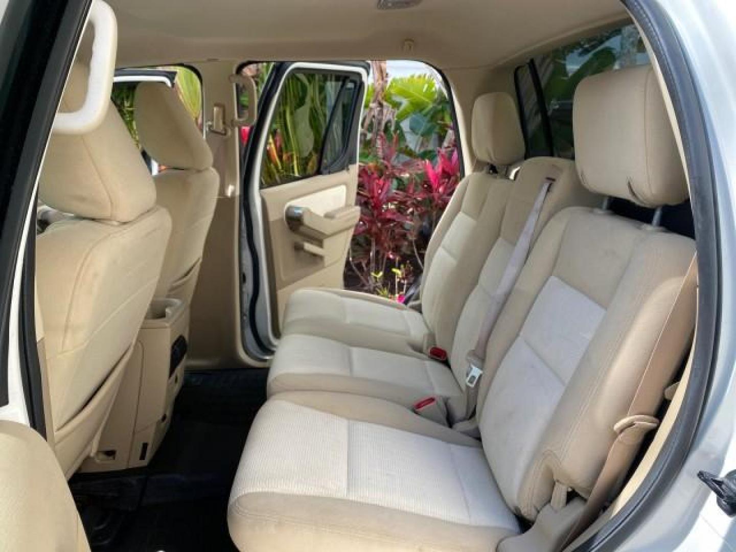 2009 White Suede /Camel Ford Explorer Sport Trac XLT LOW MILES 73,848 (1FMEU31E99U) with an 4.0L SOHC 12-Valve V6 Engine engine, Automatic transmission, located at 4701 North Dixie Hwy, Pompano Beach, FL, 33064, (954) 422-2889, 26.240938, -80.123474 - OUR WEBPAGE FLORIDACARS1.COM HAS OVER 100 PHOTOS AND FREE CARFAX LINK 2009 Ford Explorer Sport Trac XLT Sport Pickup 4.0L V6 F SOHC 12V Gasoline 21 MPG Rear Wheel Drive Features ABS Brakes Air Conditioning Alloy Wheels AM/FM Stereo Automatic Transmission Auxiliary Audio Input CD Audio Cloth Seats Cr - Photo#14