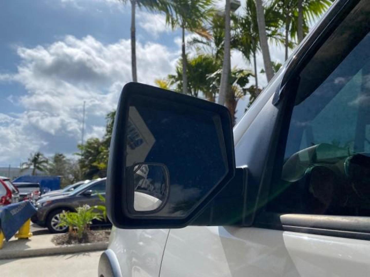2009 White Suede /Camel Ford Explorer Sport Trac XLT LOW MILES 73,848 (1FMEU31E99U) with an 4.0L SOHC 12-Valve V6 Engine engine, Automatic transmission, located at 4701 North Dixie Hwy, Pompano Beach, FL, 33064, (954) 422-2889, 26.240938, -80.123474 - OUR WEBPAGE FLORIDACARS1.COM HAS OVER 100 PHOTOS AND FREE CARFAX LINK 2009 Ford Explorer Sport Trac XLT Sport Pickup 4.0L V6 F SOHC 12V Gasoline 21 MPG Rear Wheel Drive Features ABS Brakes Air Conditioning Alloy Wheels AM/FM Stereo Automatic Transmission Auxiliary Audio Input CD Audio Cloth Seats Cr - Photo#38