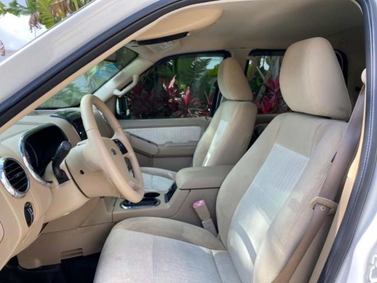 2009 White Suede /Camel Ford Explorer Sport Trac XLT LOW MILES 73,848 (1FMEU31E99U) with an 4.0L SOHC 12-Valve V6 Engine engine, Automatic transmission, located at 4701 North Dixie Hwy, Pompano Beach, FL, 33064, (954) 422-2889, 26.240938, -80.123474 - OUR WEBPAGE FLORIDACARS1.COM HAS OVER 100 PHOTOS AND FREE CARFAX LINK 2009 Ford Explorer Sport Trac XLT Sport Pickup 4.0L V6 F SOHC 12V Gasoline 21 MPG Rear Wheel Drive Features ABS Brakes Air Conditioning Alloy Wheels AM/FM Stereo Automatic Transmission Auxiliary Audio Input CD Audio Cloth Seats Cr - Photo#42