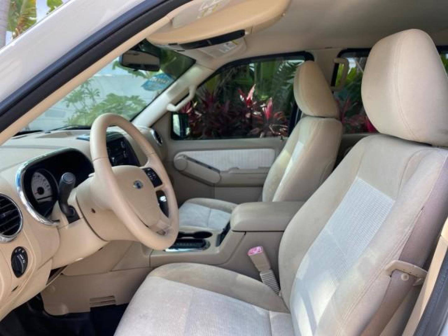 2009 White Suede /Camel Ford Explorer Sport Trac XLT LOW MILES 73,848 (1FMEU31E99U) with an 4.0L SOHC 12-Valve V6 Engine engine, Automatic transmission, located at 4701 North Dixie Hwy, Pompano Beach, FL, 33064, (954) 422-2889, 26.240938, -80.123474 - OUR WEBPAGE FLORIDACARS1.COM HAS OVER 100 PHOTOS AND FREE CARFAX LINK 2009 Ford Explorer Sport Trac XLT Sport Pickup 4.0L V6 F SOHC 12V Gasoline 21 MPG Rear Wheel Drive Features ABS Brakes Air Conditioning Alloy Wheels AM/FM Stereo Automatic Transmission Auxiliary Audio Input CD Audio Cloth Seats Cr - Photo#43