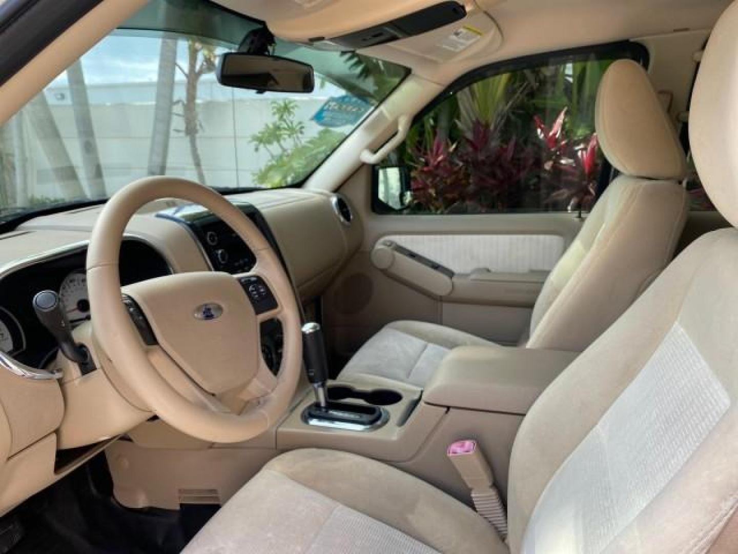2009 White Suede /Camel Ford Explorer Sport Trac XLT LOW MILES 73,848 (1FMEU31E99U) with an 4.0L SOHC 12-Valve V6 Engine engine, Automatic transmission, located at 4701 North Dixie Hwy, Pompano Beach, FL, 33064, (954) 422-2889, 26.240938, -80.123474 - OUR WEBPAGE FLORIDACARS1.COM HAS OVER 100 PHOTOS AND FREE CARFAX LINK 2009 Ford Explorer Sport Trac XLT Sport Pickup 4.0L V6 F SOHC 12V Gasoline 21 MPG Rear Wheel Drive Features ABS Brakes Air Conditioning Alloy Wheels AM/FM Stereo Automatic Transmission Auxiliary Audio Input CD Audio Cloth Seats Cr - Photo#44