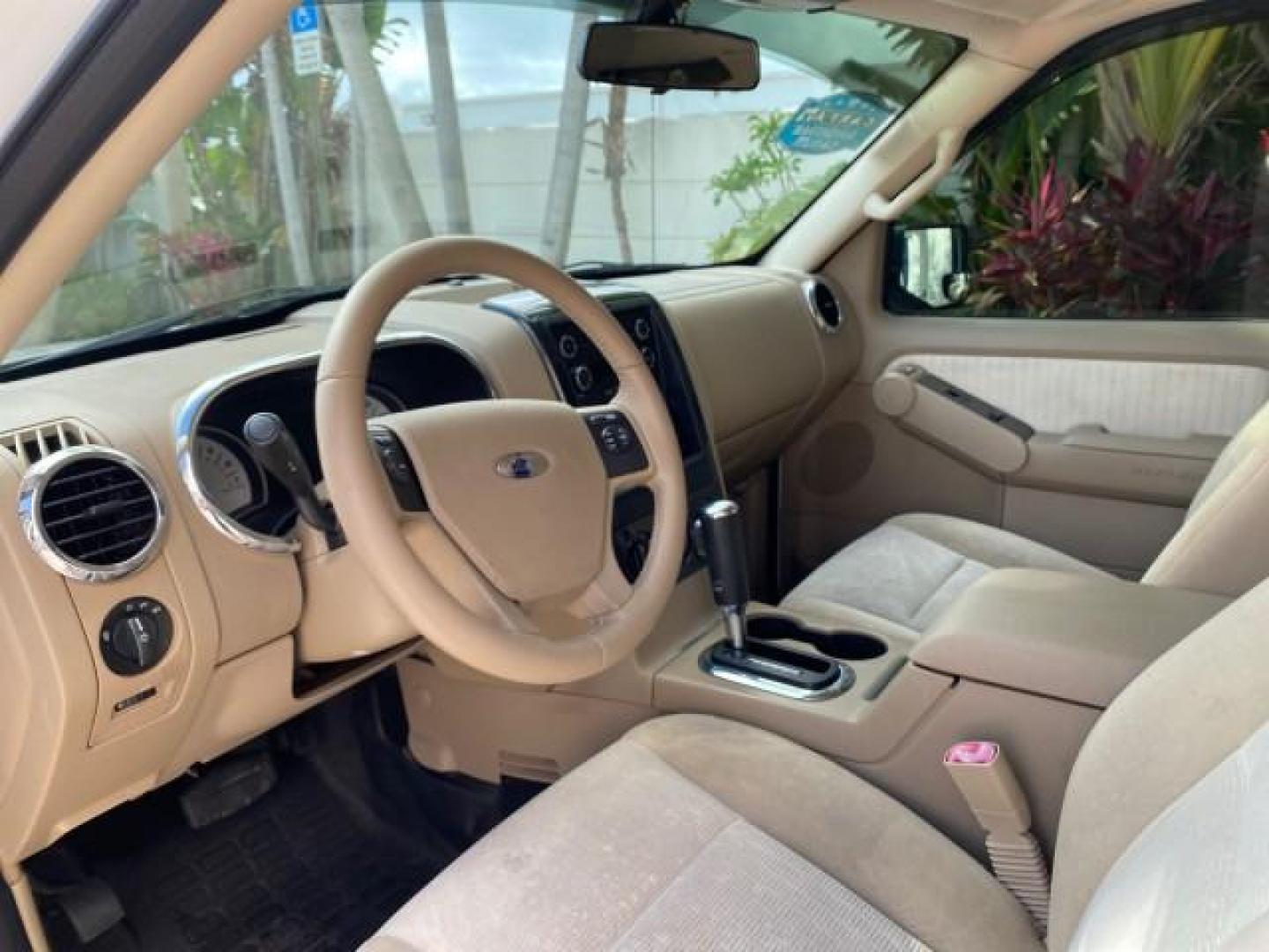 2009 White Suede /Camel Ford Explorer Sport Trac XLT LOW MILES 73,848 (1FMEU31E99U) with an 4.0L SOHC 12-Valve V6 Engine engine, Automatic transmission, located at 4701 North Dixie Hwy, Pompano Beach, FL, 33064, (954) 422-2889, 26.240938, -80.123474 - OUR WEBPAGE FLORIDACARS1.COM HAS OVER 100 PHOTOS AND FREE CARFAX LINK 2009 Ford Explorer Sport Trac XLT Sport Pickup 4.0L V6 F SOHC 12V Gasoline 21 MPG Rear Wheel Drive Features ABS Brakes Air Conditioning Alloy Wheels AM/FM Stereo Automatic Transmission Auxiliary Audio Input CD Audio Cloth Seats Cr - Photo#45