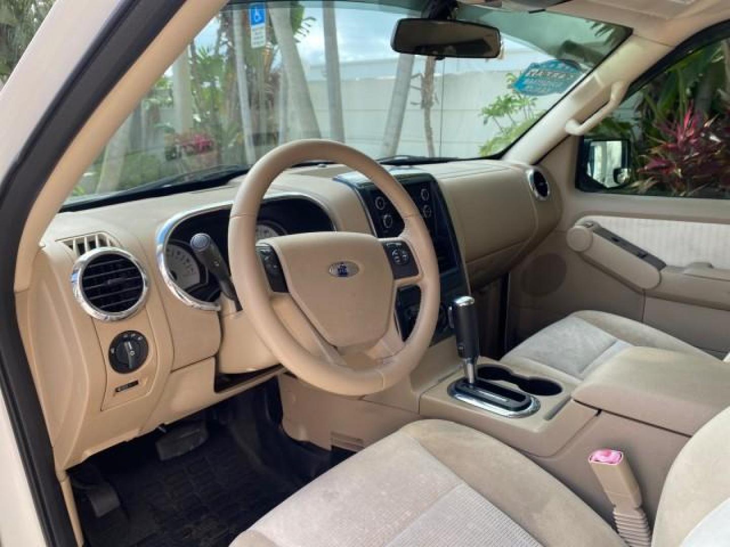 2009 White Suede /Camel Ford Explorer Sport Trac XLT LOW MILES 73,848 (1FMEU31E99U) with an 4.0L SOHC 12-Valve V6 Engine engine, Automatic transmission, located at 4701 North Dixie Hwy, Pompano Beach, FL, 33064, (954) 422-2889, 26.240938, -80.123474 - OUR WEBPAGE FLORIDACARS1.COM HAS OVER 100 PHOTOS AND FREE CARFAX LINK 2009 Ford Explorer Sport Trac XLT Sport Pickup 4.0L V6 F SOHC 12V Gasoline 21 MPG Rear Wheel Drive Features ABS Brakes Air Conditioning Alloy Wheels AM/FM Stereo Automatic Transmission Auxiliary Audio Input CD Audio Cloth Seats Cr - Photo#46