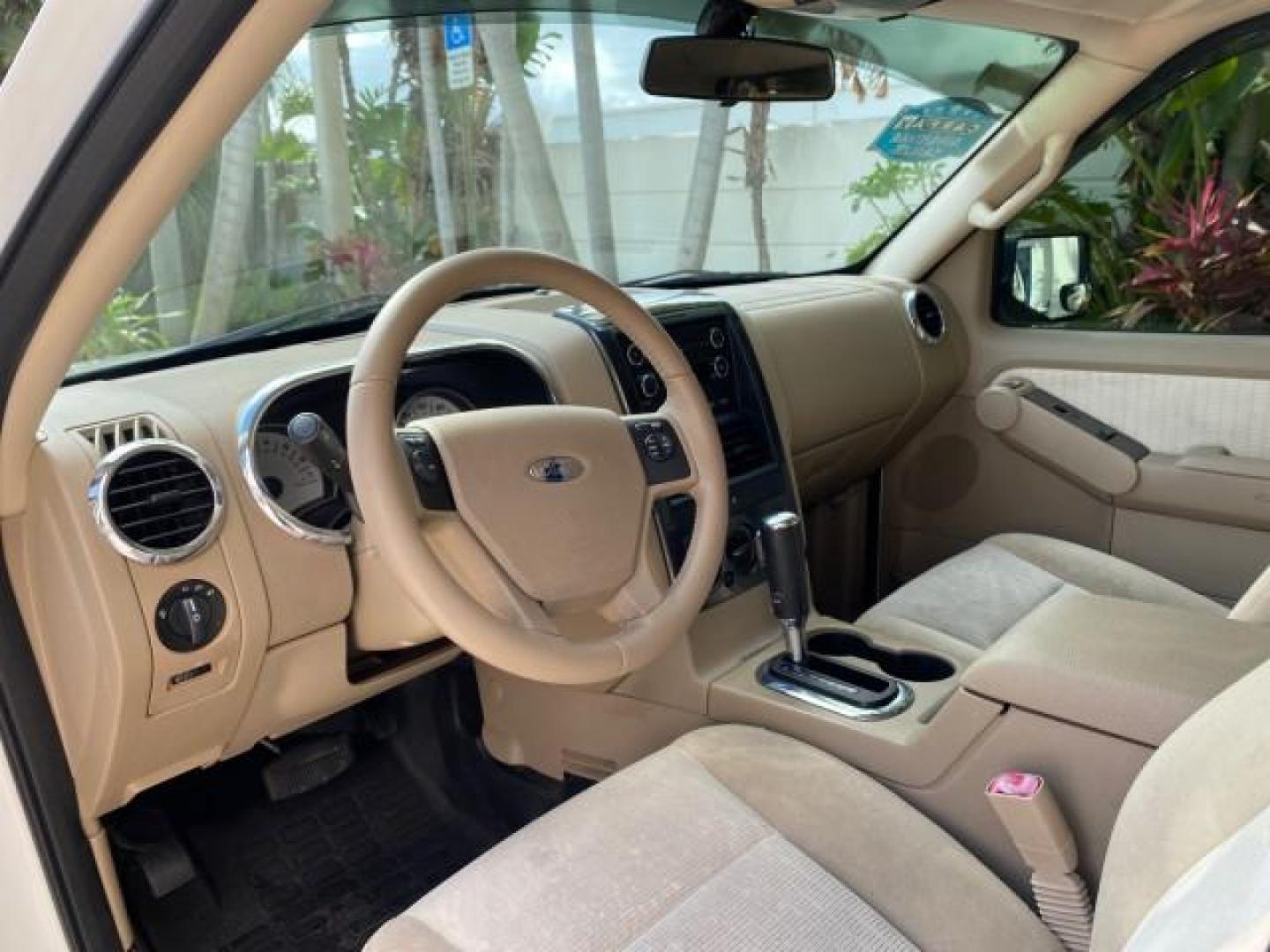 2009 White Suede /Camel Ford Explorer Sport Trac XLT LOW MILES 73,848 (1FMEU31E99U) with an 4.0L SOHC 12-Valve V6 Engine engine, Automatic transmission, located at 4701 North Dixie Hwy, Pompano Beach, FL, 33064, (954) 422-2889, 26.240938, -80.123474 - OUR WEBPAGE FLORIDACARS1.COM HAS OVER 100 PHOTOS AND FREE CARFAX LINK 2009 Ford Explorer Sport Trac XLT Sport Pickup 4.0L V6 F SOHC 12V Gasoline 21 MPG Rear Wheel Drive Features ABS Brakes Air Conditioning Alloy Wheels AM/FM Stereo Automatic Transmission Auxiliary Audio Input CD Audio Cloth Seats Cr - Photo#47