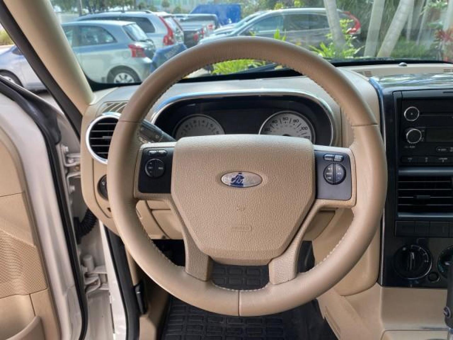 2009 White Suede /Camel Ford Explorer Sport Trac XLT LOW MILES 73,848 (1FMEU31E99U) with an 4.0L SOHC 12-Valve V6 Engine engine, Automatic transmission, located at 4701 North Dixie Hwy, Pompano Beach, FL, 33064, (954) 422-2889, 26.240938, -80.123474 - OUR WEBPAGE FLORIDACARS1.COM HAS OVER 100 PHOTOS AND FREE CARFAX LINK 2009 Ford Explorer Sport Trac XLT Sport Pickup 4.0L V6 F SOHC 12V Gasoline 21 MPG Rear Wheel Drive Features ABS Brakes Air Conditioning Alloy Wheels AM/FM Stereo Automatic Transmission Auxiliary Audio Input CD Audio Cloth Seats Cr - Photo#48