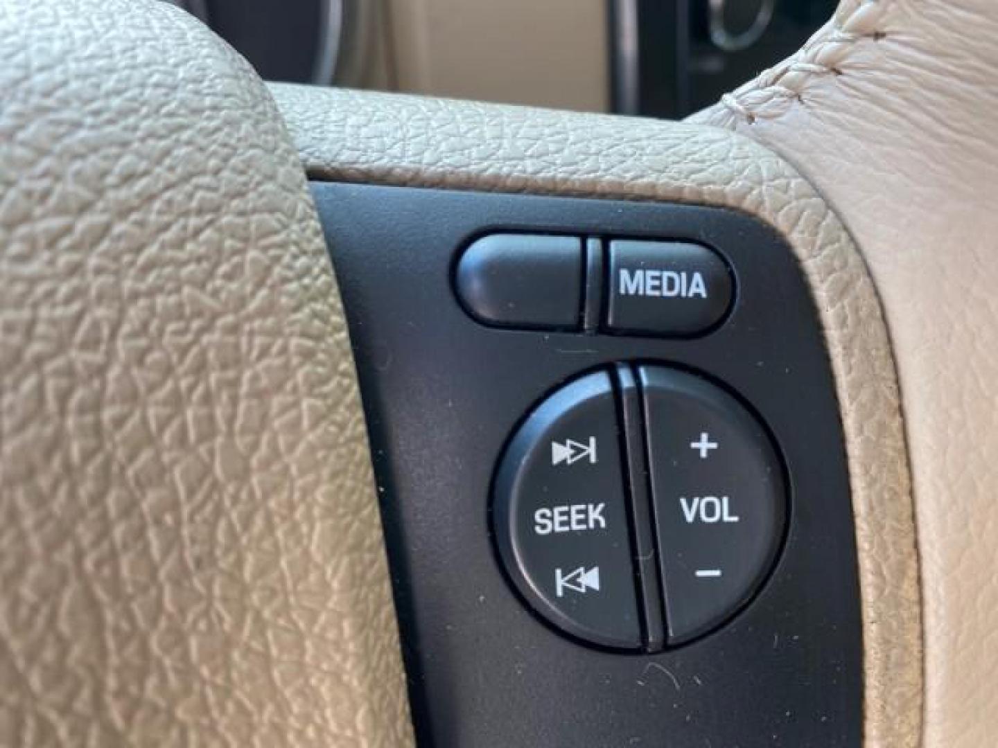 2009 White Suede /Camel Ford Explorer Sport Trac XLT LOW MILES 73,848 (1FMEU31E99U) with an 4.0L SOHC 12-Valve V6 Engine engine, Automatic transmission, located at 4701 North Dixie Hwy, Pompano Beach, FL, 33064, (954) 422-2889, 26.240938, -80.123474 - OUR WEBPAGE FLORIDACARS1.COM HAS OVER 100 PHOTOS AND FREE CARFAX LINK 2009 Ford Explorer Sport Trac XLT Sport Pickup 4.0L V6 F SOHC 12V Gasoline 21 MPG Rear Wheel Drive Features ABS Brakes Air Conditioning Alloy Wheels AM/FM Stereo Automatic Transmission Auxiliary Audio Input CD Audio Cloth Seats Cr - Photo#50