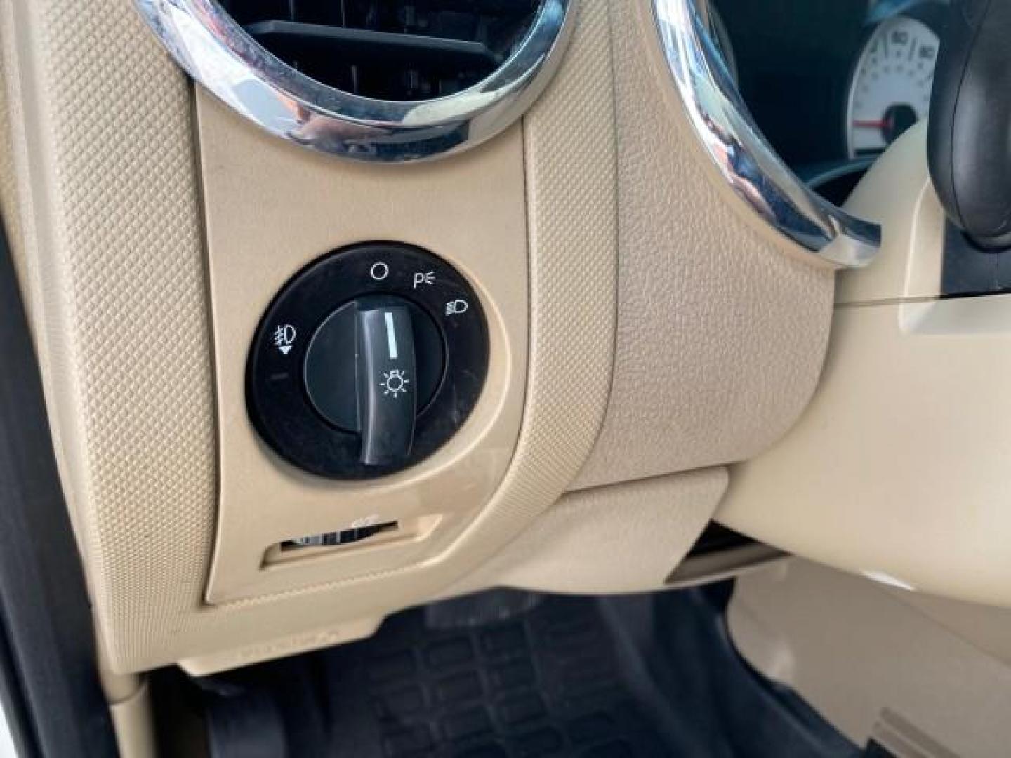 2009 White Suede /Camel Ford Explorer Sport Trac XLT LOW MILES 73,848 (1FMEU31E99U) with an 4.0L SOHC 12-Valve V6 Engine engine, Automatic transmission, located at 4701 North Dixie Hwy, Pompano Beach, FL, 33064, (954) 422-2889, 26.240938, -80.123474 - OUR WEBPAGE FLORIDACARS1.COM HAS OVER 100 PHOTOS AND FREE CARFAX LINK 2009 Ford Explorer Sport Trac XLT Sport Pickup 4.0L V6 F SOHC 12V Gasoline 21 MPG Rear Wheel Drive Features ABS Brakes Air Conditioning Alloy Wheels AM/FM Stereo Automatic Transmission Auxiliary Audio Input CD Audio Cloth Seats Cr - Photo#52