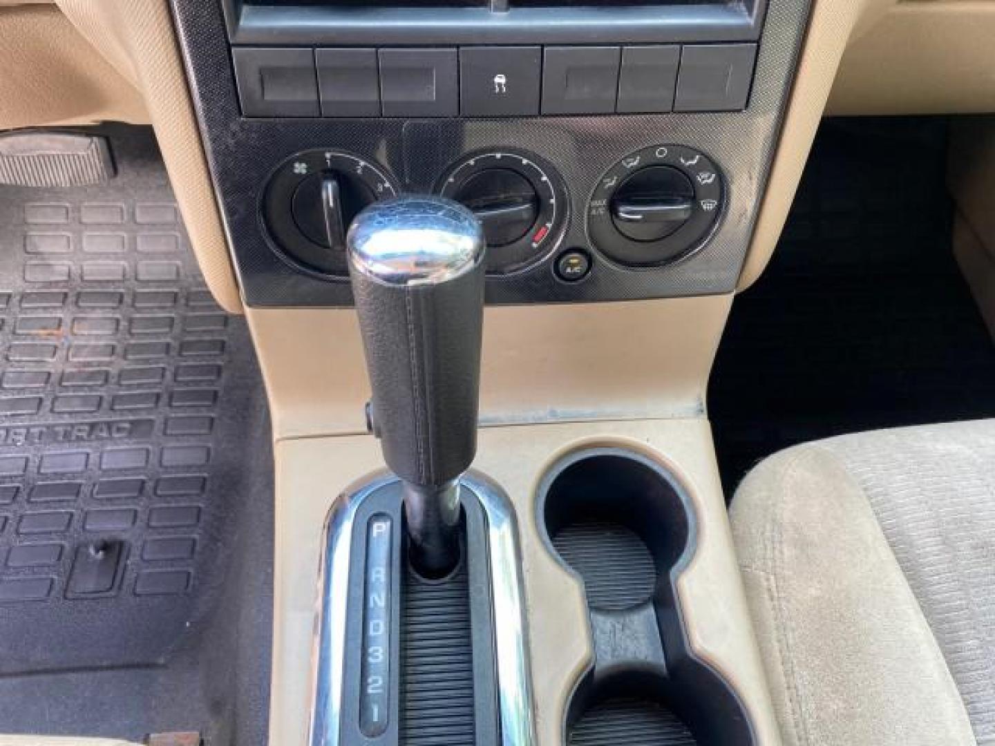 2009 White Suede /Camel Ford Explorer Sport Trac XLT LOW MILES 73,848 (1FMEU31E99U) with an 4.0L SOHC 12-Valve V6 Engine engine, Automatic transmission, located at 4701 North Dixie Hwy, Pompano Beach, FL, 33064, (954) 422-2889, 26.240938, -80.123474 - OUR WEBPAGE FLORIDACARS1.COM HAS OVER 100 PHOTOS AND FREE CARFAX LINK 2009 Ford Explorer Sport Trac XLT Sport Pickup 4.0L V6 F SOHC 12V Gasoline 21 MPG Rear Wheel Drive Features ABS Brakes Air Conditioning Alloy Wheels AM/FM Stereo Automatic Transmission Auxiliary Audio Input CD Audio Cloth Seats Cr - Photo#57