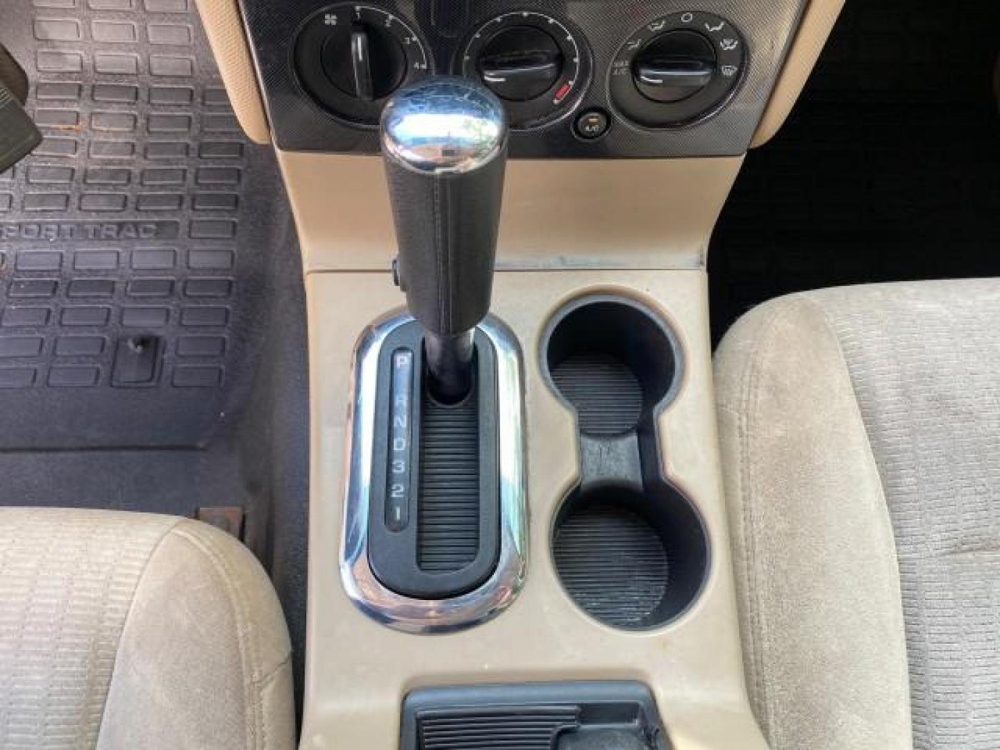 2009 White Suede /Camel Ford Explorer Sport Trac XLT LOW MILES 73,848 (1FMEU31E99U) with an 4.0L SOHC 12-Valve V6 Engine engine, Automatic transmission, located at 4701 North Dixie Hwy, Pompano Beach, FL, 33064, (954) 422-2889, 26.240938, -80.123474 - OUR WEBPAGE FLORIDACARS1.COM HAS OVER 100 PHOTOS AND FREE CARFAX LINK 2009 Ford Explorer Sport Trac XLT Sport Pickup 4.0L V6 F SOHC 12V Gasoline 21 MPG Rear Wheel Drive Features ABS Brakes Air Conditioning Alloy Wheels AM/FM Stereo Automatic Transmission Auxiliary Audio Input CD Audio Cloth Seats Cr - Photo#58