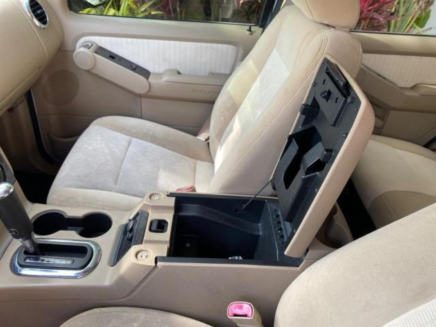 2009 White Suede /Camel Ford Explorer Sport Trac XLT LOW MILES 73,848 (1FMEU31E99U) with an 4.0L SOHC 12-Valve V6 Engine engine, Automatic transmission, located at 4701 North Dixie Hwy, Pompano Beach, FL, 33064, (954) 422-2889, 26.240938, -80.123474 - OUR WEBPAGE FLORIDACARS1.COM HAS OVER 100 PHOTOS AND FREE CARFAX LINK 2009 Ford Explorer Sport Trac XLT Sport Pickup 4.0L V6 F SOHC 12V Gasoline 21 MPG Rear Wheel Drive Features ABS Brakes Air Conditioning Alloy Wheels AM/FM Stereo Automatic Transmission Auxiliary Audio Input CD Audio Cloth Seats Cr - Photo#61