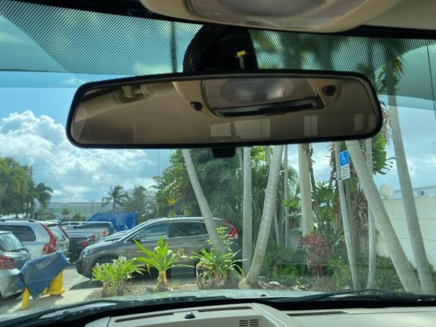 2009 White Suede /Camel Ford Explorer Sport Trac XLT LOW MILES 73,848 (1FMEU31E99U) with an 4.0L SOHC 12-Valve V6 Engine engine, Automatic transmission, located at 4701 North Dixie Hwy, Pompano Beach, FL, 33064, (954) 422-2889, 26.240938, -80.123474 - OUR WEBPAGE FLORIDACARS1.COM HAS OVER 100 PHOTOS AND FREE CARFAX LINK 2009 Ford Explorer Sport Trac XLT Sport Pickup 4.0L V6 F SOHC 12V Gasoline 21 MPG Rear Wheel Drive Features ABS Brakes Air Conditioning Alloy Wheels AM/FM Stereo Automatic Transmission Auxiliary Audio Input CD Audio Cloth Seats Cr - Photo#62