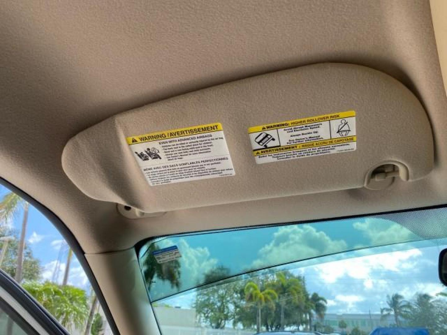 2009 White Suede /Camel Ford Explorer Sport Trac XLT LOW MILES 73,848 (1FMEU31E99U) with an 4.0L SOHC 12-Valve V6 Engine engine, Automatic transmission, located at 4701 North Dixie Hwy, Pompano Beach, FL, 33064, (954) 422-2889, 26.240938, -80.123474 - OUR WEBPAGE FLORIDACARS1.COM HAS OVER 100 PHOTOS AND FREE CARFAX LINK 2009 Ford Explorer Sport Trac XLT Sport Pickup 4.0L V6 F SOHC 12V Gasoline 21 MPG Rear Wheel Drive Features ABS Brakes Air Conditioning Alloy Wheels AM/FM Stereo Automatic Transmission Auxiliary Audio Input CD Audio Cloth Seats Cr - Photo#63