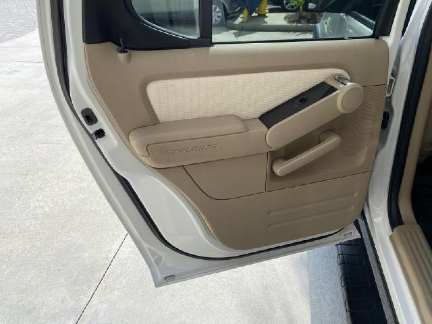 2009 White Suede /Camel Ford Explorer Sport Trac XLT LOW MILES 73,848 (1FMEU31E99U) with an 4.0L SOHC 12-Valve V6 Engine engine, Automatic transmission, located at 4701 North Dixie Hwy, Pompano Beach, FL, 33064, (954) 422-2889, 26.240938, -80.123474 - OUR WEBPAGE FLORIDACARS1.COM HAS OVER 100 PHOTOS AND FREE CARFAX LINK 2009 Ford Explorer Sport Trac XLT Sport Pickup 4.0L V6 F SOHC 12V Gasoline 21 MPG Rear Wheel Drive Features ABS Brakes Air Conditioning Alloy Wheels AM/FM Stereo Automatic Transmission Auxiliary Audio Input CD Audio Cloth Seats Cr - Photo#72