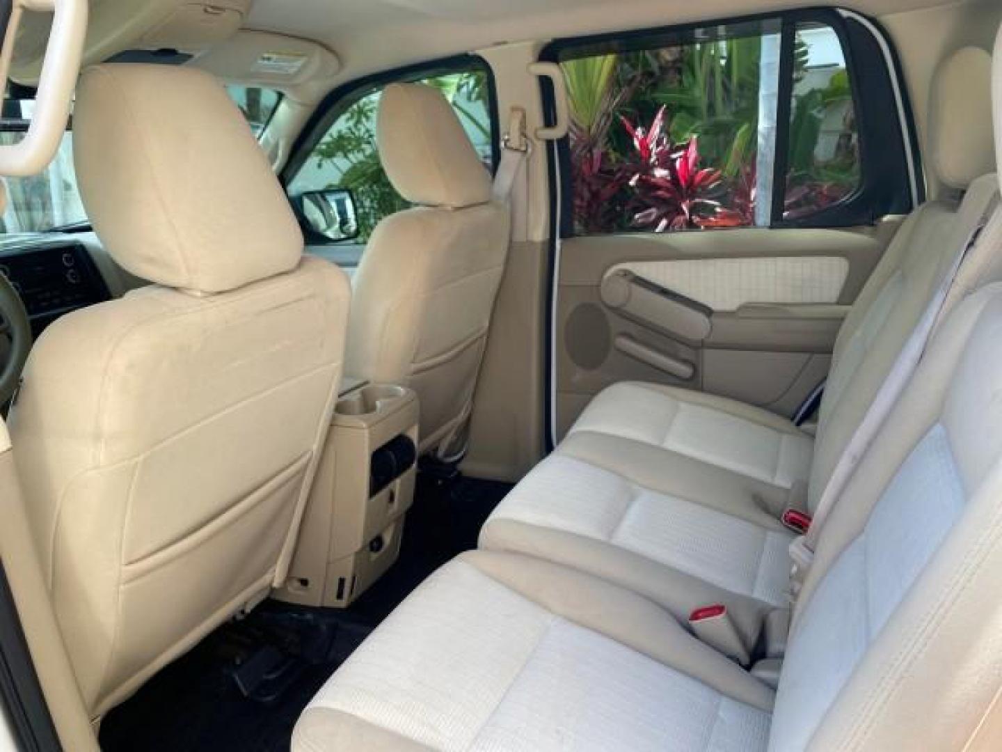 2009 White Suede /Camel Ford Explorer Sport Trac XLT LOW MILES 73,848 (1FMEU31E99U) with an 4.0L SOHC 12-Valve V6 Engine engine, Automatic transmission, located at 4701 North Dixie Hwy, Pompano Beach, FL, 33064, (954) 422-2889, 26.240938, -80.123474 - OUR WEBPAGE FLORIDACARS1.COM HAS OVER 100 PHOTOS AND FREE CARFAX LINK 2009 Ford Explorer Sport Trac XLT Sport Pickup 4.0L V6 F SOHC 12V Gasoline 21 MPG Rear Wheel Drive Features ABS Brakes Air Conditioning Alloy Wheels AM/FM Stereo Automatic Transmission Auxiliary Audio Input CD Audio Cloth Seats Cr - Photo#75