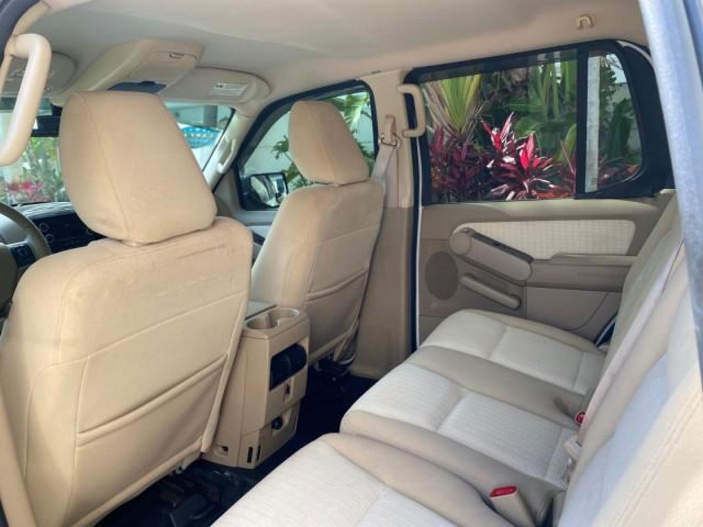 2009 White Suede /Camel Ford Explorer Sport Trac XLT LOW MILES 73,848 (1FMEU31E99U) with an 4.0L SOHC 12-Valve V6 Engine engine, Automatic transmission, located at 4701 North Dixie Hwy, Pompano Beach, FL, 33064, (954) 422-2889, 26.240938, -80.123474 - OUR WEBPAGE FLORIDACARS1.COM HAS OVER 100 PHOTOS AND FREE CARFAX LINK 2009 Ford Explorer Sport Trac XLT Sport Pickup 4.0L V6 F SOHC 12V Gasoline 21 MPG Rear Wheel Drive Features ABS Brakes Air Conditioning Alloy Wheels AM/FM Stereo Automatic Transmission Auxiliary Audio Input CD Audio Cloth Seats Cr - Photo#76