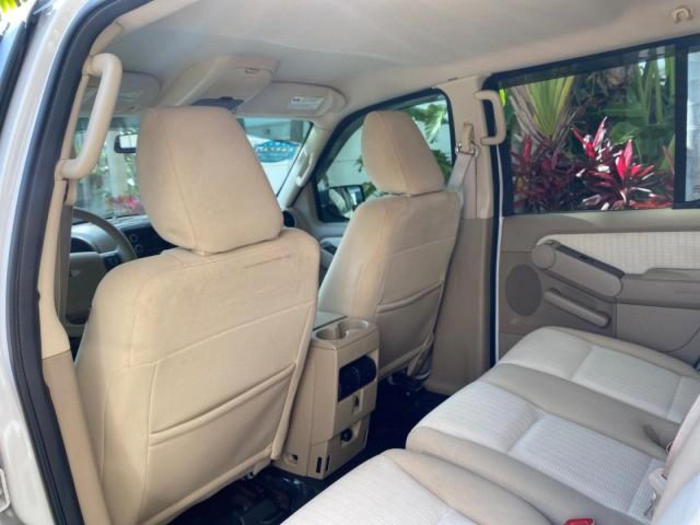 2009 White Suede /Camel Ford Explorer Sport Trac XLT LOW MILES 73,848 (1FMEU31E99U) with an 4.0L SOHC 12-Valve V6 Engine engine, Automatic transmission, located at 4701 North Dixie Hwy, Pompano Beach, FL, 33064, (954) 422-2889, 26.240938, -80.123474 - OUR WEBPAGE FLORIDACARS1.COM HAS OVER 100 PHOTOS AND FREE CARFAX LINK 2009 Ford Explorer Sport Trac XLT Sport Pickup 4.0L V6 F SOHC 12V Gasoline 21 MPG Rear Wheel Drive Features ABS Brakes Air Conditioning Alloy Wheels AM/FM Stereo Automatic Transmission Auxiliary Audio Input CD Audio Cloth Seats Cr - Photo#77