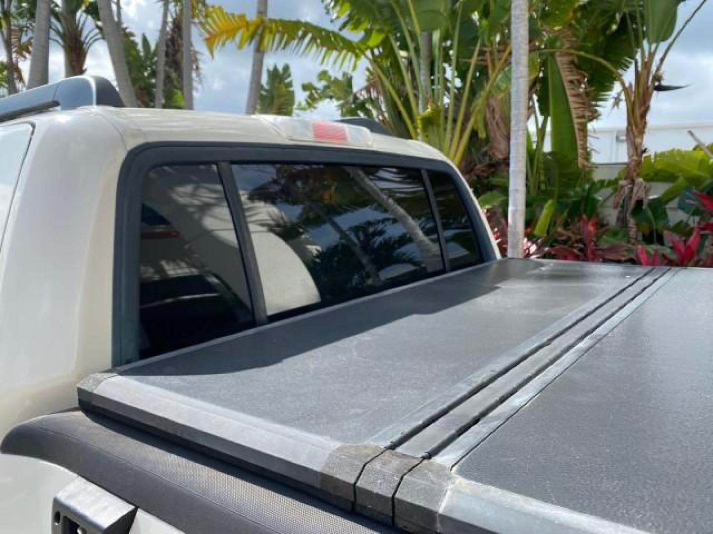 2009 White Suede /Camel Ford Explorer Sport Trac XLT LOW MILES 73,848 (1FMEU31E99U) with an 4.0L SOHC 12-Valve V6 Engine engine, Automatic transmission, located at 4701 North Dixie Hwy, Pompano Beach, FL, 33064, (954) 422-2889, 26.240938, -80.123474 - OUR WEBPAGE FLORIDACARS1.COM HAS OVER 100 PHOTOS AND FREE CARFAX LINK 2009 Ford Explorer Sport Trac XLT Sport Pickup 4.0L V6 F SOHC 12V Gasoline 21 MPG Rear Wheel Drive Features ABS Brakes Air Conditioning Alloy Wheels AM/FM Stereo Automatic Transmission Auxiliary Audio Input CD Audio Cloth Seats Cr - Photo#94