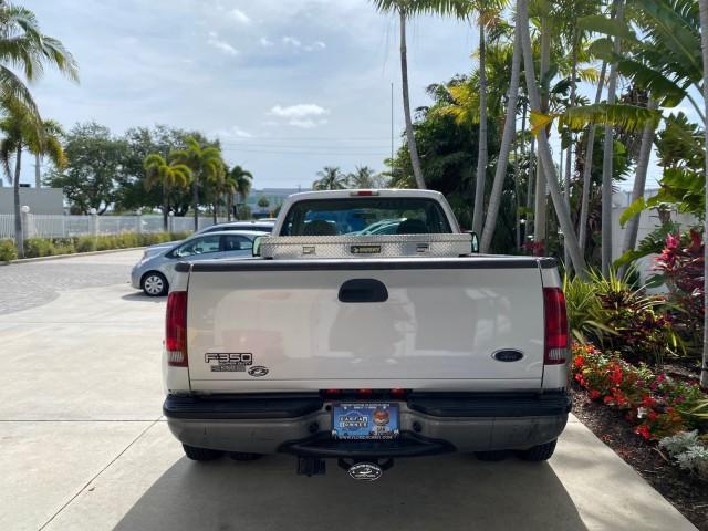 2001 Silver Metallic /Medium Graphite Ford Super Duty F-350 DRW DUALLY XL 1 OWNER LOW MILES 14,269 (1FTWF32SX1E) with an 6.8L SOHC SEFI V10 Engine engine, Automatic transmission, located at 4701 North Dixie Hwy, Pompano Beach, FL, 33064, (954) 422-2889, 26.240938, -80.123474 - OUR WEBPAGE FLORIDACARS1.COM HAS OVER 100 PHOTOS AND FREE CARFAX LINK 2001 Ford F-350 Super Duty Dually XL 1 OWNER Pickup 6.8L V10 F SOHC Gasoline Rear Wheel Drive Features ABS Brakes Air Conditioning AM/FM Stereo Automatic Transmission Cassette Player Dual Rear Wheels Long Bed Tow Hitch Vinyl Seats - Photo#6