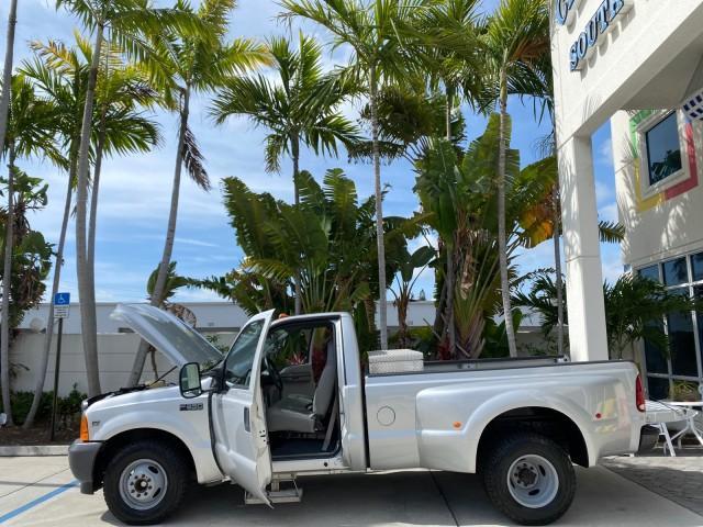 2001 Silver Metallic /Medium Graphite Ford Super Duty F-350 DRW DUALLY XL 1 OWNER LOW MILES 14,269 (1FTWF32SX1E) with an 6.8L SOHC SEFI V10 Engine engine, Automatic transmission, located at 4701 North Dixie Hwy, Pompano Beach, FL, 33064, (954) 422-2889, 26.240938, -80.123474 - OUR WEBPAGE FLORIDACARS1.COM HAS OVER 100 PHOTOS AND FREE CARFAX LINK 2001 Ford F-350 Super Duty Dually XL 1 OWNER Pickup 6.8L V10 F SOHC Gasoline Rear Wheel Drive Features ABS Brakes Air Conditioning AM/FM Stereo Automatic Transmission Cassette Player Dual Rear Wheels Long Bed Tow Hitch Vinyl Seats - Photo#8