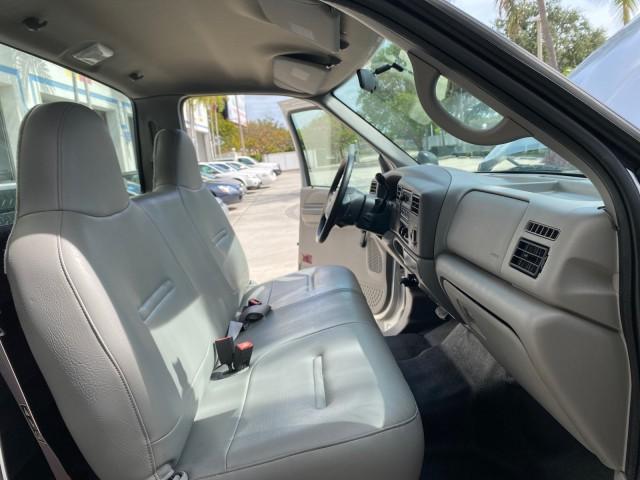 2001 Silver Metallic /Medium Graphite Ford Super Duty F-350 DRW DUALLY XL 1 OWNER LOW MILES 14,269 (1FTWF32SX1E) with an 6.8L SOHC SEFI V10 Engine engine, Automatic transmission, located at 4701 North Dixie Hwy, Pompano Beach, FL, 33064, (954) 422-2889, 26.240938, -80.123474 - OUR WEBPAGE FLORIDACARS1.COM HAS OVER 100 PHOTOS AND FREE CARFAX LINK 2001 Ford F-350 Super Duty Dually XL 1 OWNER Pickup 6.8L V10 F SOHC Gasoline Rear Wheel Drive Features ABS Brakes Air Conditioning AM/FM Stereo Automatic Transmission Cassette Player Dual Rear Wheels Long Bed Tow Hitch Vinyl Seats - Photo#12