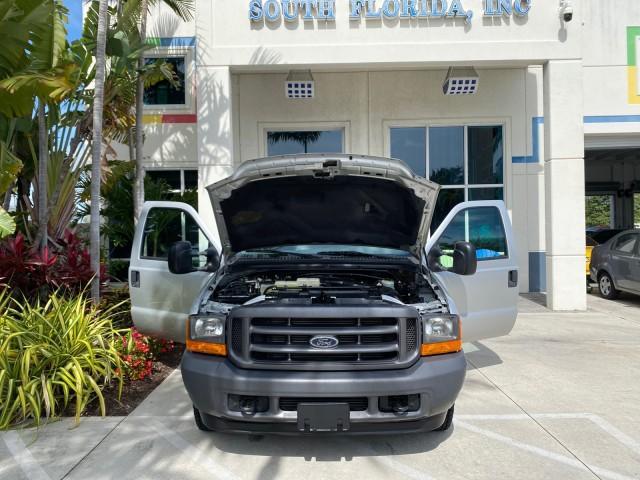 2001 Silver Metallic /Medium Graphite Ford Super Duty F-350 DRW DUALLY XL 1 OWNER LOW MILES 14,269 (1FTWF32SX1E) with an 6.8L SOHC SEFI V10 Engine engine, Automatic transmission, located at 4701 North Dixie Hwy, Pompano Beach, FL, 33064, (954) 422-2889, 26.240938, -80.123474 - OUR WEBPAGE FLORIDACARS1.COM HAS OVER 100 PHOTOS AND FREE CARFAX LINK 2001 Ford F-350 Super Duty Dually XL 1 OWNER Pickup 6.8L V10 F SOHC Gasoline Rear Wheel Drive Features ABS Brakes Air Conditioning AM/FM Stereo Automatic Transmission Cassette Player Dual Rear Wheels Long Bed Tow Hitch Vinyl Seats - Photo#16