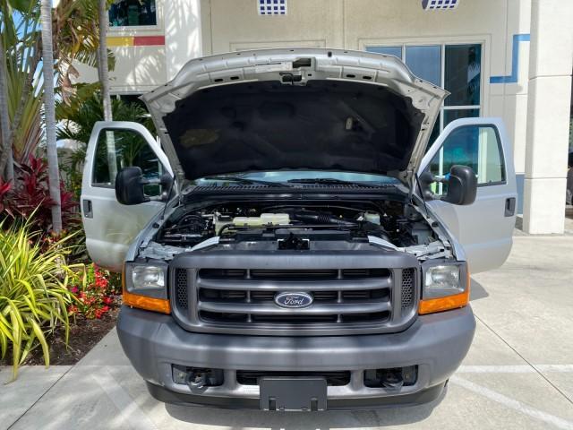 2001 Silver Metallic /Medium Graphite Ford Super Duty F-350 DRW DUALLY XL 1 OWNER LOW MILES 14,269 (1FTWF32SX1E) with an 6.8L SOHC SEFI V10 Engine engine, Automatic transmission, located at 4701 North Dixie Hwy, Pompano Beach, FL, 33064, (954) 422-2889, 26.240938, -80.123474 - OUR WEBPAGE FLORIDACARS1.COM HAS OVER 100 PHOTOS AND FREE CARFAX LINK 2001 Ford F-350 Super Duty Dually XL 1 OWNER Pickup 6.8L V10 F SOHC Gasoline Rear Wheel Drive Features ABS Brakes Air Conditioning AM/FM Stereo Automatic Transmission Cassette Player Dual Rear Wheels Long Bed Tow Hitch Vinyl Seats - Photo#17