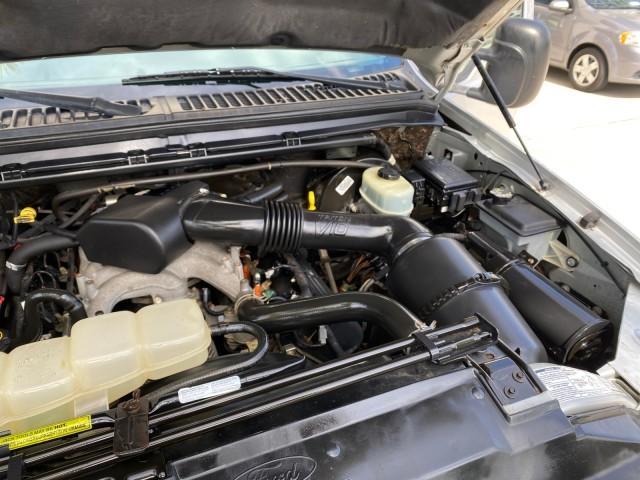 2001 Silver Metallic /Medium Graphite Ford Super Duty F-350 DRW DUALLY XL 1 OWNER LOW MILES 14,269 (1FTWF32SX1E) with an 6.8L SOHC SEFI V10 Engine engine, Automatic transmission, located at 4701 North Dixie Hwy, Pompano Beach, FL, 33064, (954) 422-2889, 26.240938, -80.123474 - OUR WEBPAGE FLORIDACARS1.COM HAS OVER 100 PHOTOS AND FREE CARFAX LINK 2001 Ford F-350 Super Duty Dually XL 1 OWNER Pickup 6.8L V10 F SOHC Gasoline Rear Wheel Drive Features ABS Brakes Air Conditioning AM/FM Stereo Automatic Transmission Cassette Player Dual Rear Wheels Long Bed Tow Hitch Vinyl Seats - Photo#25