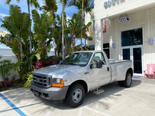 2001 Silver Metallic /Medium Graphite Ford Super Duty F-350 DRW DUALLY XL 1 OWNER LOW MILES 14,269 (1FTWF32SX1E) with an 6.8L SOHC SEFI V10 Engine engine, Automatic transmission, located at 4701 North Dixie Hwy, Pompano Beach, FL, 33064, (954) 422-2889, 26.240938, -80.123474 - OUR WEBPAGE FLORIDACARS1.COM HAS OVER 100 PHOTOS AND FREE CARFAX LINK 2001 Ford F-350 Super Duty Dually XL 1 OWNER Pickup 6.8L V10 F SOHC Gasoline Rear Wheel Drive Features ABS Brakes Air Conditioning AM/FM Stereo Automatic Transmission Cassette Player Dual Rear Wheels Long Bed Tow Hitch Vinyl Seats - Photo#28