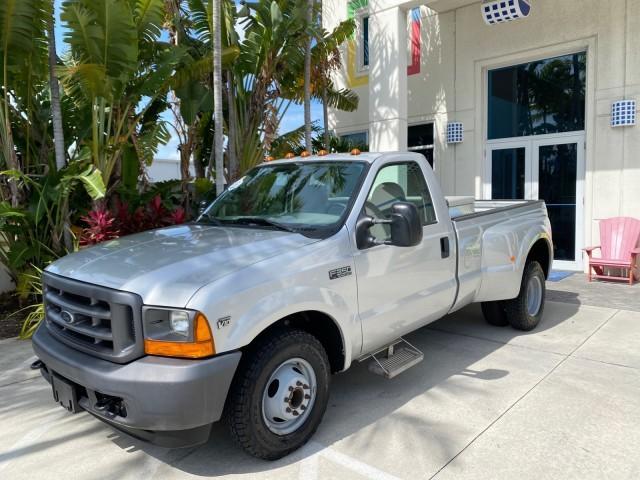 2001 Silver Metallic /Medium Graphite Ford Super Duty F-350 DRW DUALLY XL 1 OWNER LOW MILES 14,269 (1FTWF32SX1E) with an 6.8L SOHC SEFI V10 Engine engine, Automatic transmission, located at 4701 North Dixie Hwy, Pompano Beach, FL, 33064, (954) 422-2889, 26.240938, -80.123474 - OUR WEBPAGE FLORIDACARS1.COM HAS OVER 100 PHOTOS AND FREE CARFAX LINK 2001 Ford F-350 Super Duty Dually XL 1 OWNER Pickup 6.8L V10 F SOHC Gasoline Rear Wheel Drive Features ABS Brakes Air Conditioning AM/FM Stereo Automatic Transmission Cassette Player Dual Rear Wheels Long Bed Tow Hitch Vinyl Seats - Photo#29