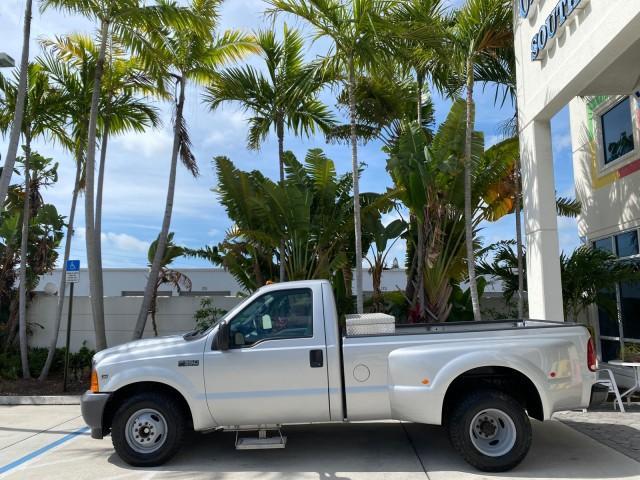 2001 Silver Metallic /Medium Graphite Ford Super Duty F-350 DRW DUALLY XL 1 OWNER LOW MILES 14,269 (1FTWF32SX1E) with an 6.8L SOHC SEFI V10 Engine engine, Automatic transmission, located at 4701 North Dixie Hwy, Pompano Beach, FL, 33064, (954) 422-2889, 26.240938, -80.123474 - OUR WEBPAGE FLORIDACARS1.COM HAS OVER 100 PHOTOS AND FREE CARFAX LINK 2001 Ford F-350 Super Duty Dually XL 1 OWNER Pickup 6.8L V10 F SOHC Gasoline Rear Wheel Drive Features ABS Brakes Air Conditioning AM/FM Stereo Automatic Transmission Cassette Player Dual Rear Wheels Long Bed Tow Hitch Vinyl Seats - Photo#30