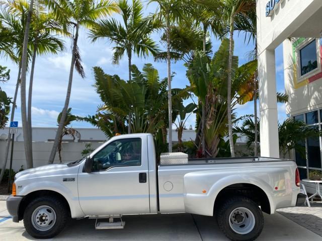 2001 Silver Metallic /Medium Graphite Ford Super Duty F-350 DRW DUALLY XL 1 OWNER LOW MILES 14,269 (1FTWF32SX1E) with an 6.8L SOHC SEFI V10 Engine engine, Automatic transmission, located at 4701 North Dixie Hwy, Pompano Beach, FL, 33064, (954) 422-2889, 26.240938, -80.123474 - OUR WEBPAGE FLORIDACARS1.COM HAS OVER 100 PHOTOS AND FREE CARFAX LINK 2001 Ford F-350 Super Duty Dually XL 1 OWNER Pickup 6.8L V10 F SOHC Gasoline Rear Wheel Drive Features ABS Brakes Air Conditioning AM/FM Stereo Automatic Transmission Cassette Player Dual Rear Wheels Long Bed Tow Hitch Vinyl Seats - Photo#31