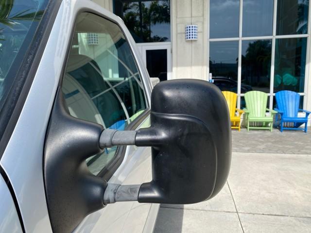 2001 Silver Metallic /Medium Graphite Ford Super Duty F-350 DRW DUALLY XL 1 OWNER LOW MILES 14,269 (1FTWF32SX1E) with an 6.8L SOHC SEFI V10 Engine engine, Automatic transmission, located at 4701 North Dixie Hwy, Pompano Beach, FL, 33064, (954) 422-2889, 26.240938, -80.123474 - OUR WEBPAGE FLORIDACARS1.COM HAS OVER 100 PHOTOS AND FREE CARFAX LINK 2001 Ford F-350 Super Duty Dually XL 1 OWNER Pickup 6.8L V10 F SOHC Gasoline Rear Wheel Drive Features ABS Brakes Air Conditioning AM/FM Stereo Automatic Transmission Cassette Player Dual Rear Wheels Long Bed Tow Hitch Vinyl Seats - Photo#41