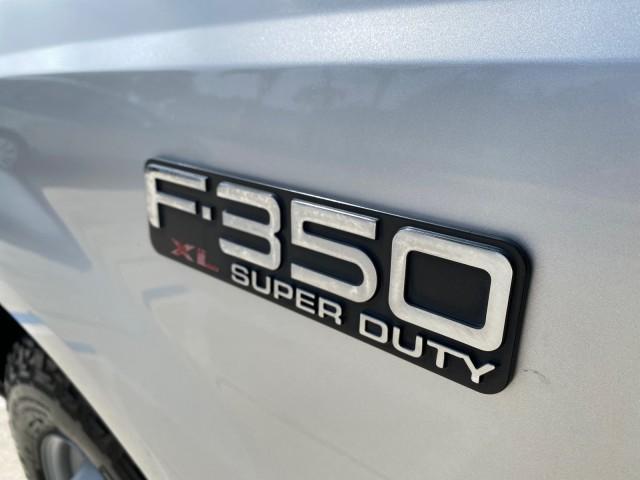 2001 Silver Metallic /Medium Graphite Ford Super Duty F-350 DRW DUALLY XL 1 OWNER LOW MILES 14,269 (1FTWF32SX1E) with an 6.8L SOHC SEFI V10 Engine engine, Automatic transmission, located at 4701 North Dixie Hwy, Pompano Beach, FL, 33064, (954) 422-2889, 26.240938, -80.123474 - OUR WEBPAGE FLORIDACARS1.COM HAS OVER 100 PHOTOS AND FREE CARFAX LINK 2001 Ford F-350 Super Duty Dually XL 1 OWNER Pickup 6.8L V10 F SOHC Gasoline Rear Wheel Drive Features ABS Brakes Air Conditioning AM/FM Stereo Automatic Transmission Cassette Player Dual Rear Wheels Long Bed Tow Hitch Vinyl Seats - Photo#42