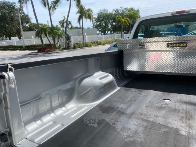 2001 Silver Metallic /Medium Graphite Ford Super Duty F-350 DRW DUALLY XL 1 OWNER LOW MILES 14,269 (1FTWF32SX1E) with an 6.8L SOHC SEFI V10 Engine engine, Automatic transmission, located at 4701 North Dixie Hwy, Pompano Beach, FL, 33064, (954) 422-2889, 26.240938, -80.123474 - OUR WEBPAGE FLORIDACARS1.COM HAS OVER 100 PHOTOS AND FREE CARFAX LINK 2001 Ford F-350 Super Duty Dually XL 1 OWNER Pickup 6.8L V10 F SOHC Gasoline Rear Wheel Drive Features ABS Brakes Air Conditioning AM/FM Stereo Automatic Transmission Cassette Player Dual Rear Wheels Long Bed Tow Hitch Vinyl Seats - Photo#89