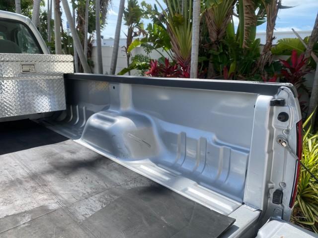 2001 Silver Metallic /Medium Graphite Ford Super Duty F-350 DRW DUALLY XL 1 OWNER LOW MILES 14,269 (1FTWF32SX1E) with an 6.8L SOHC SEFI V10 Engine engine, Automatic transmission, located at 4701 North Dixie Hwy, Pompano Beach, FL, 33064, (954) 422-2889, 26.240938, -80.123474 - OUR WEBPAGE FLORIDACARS1.COM HAS OVER 100 PHOTOS AND FREE CARFAX LINK 2001 Ford F-350 Super Duty Dually XL 1 OWNER Pickup 6.8L V10 F SOHC Gasoline Rear Wheel Drive Features ABS Brakes Air Conditioning AM/FM Stereo Automatic Transmission Cassette Player Dual Rear Wheels Long Bed Tow Hitch Vinyl Seats - Photo#91