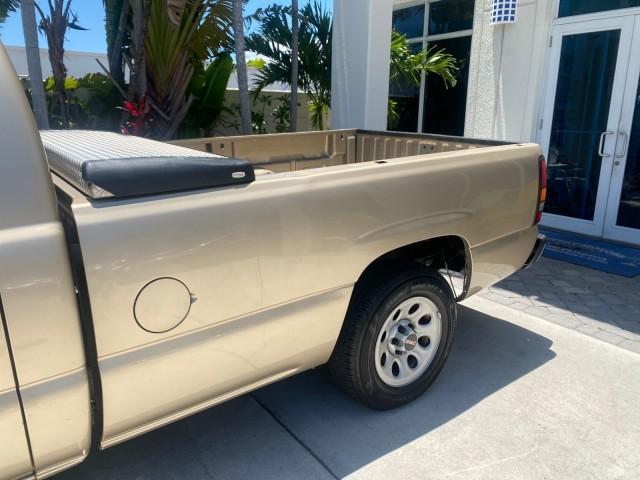 2005 Sand Beige Metallic /Neutral GMC Sierra 1500 LOW MILES 83837 AC NO ACCIDENTS (1GTEC14X15Z) with an 4.3L Vortec 4300 V6 MFI Engine engine, Automatic transmission, located at 4701 North Dixie Hwy, Pompano Beach, FL, 33064, (954) 422-2889, 26.240938, -80.123474 - OUR WEBPAGE FLORIDACARS1.COM HAS OVER 100 PHOTOS AND FREE CARFAX LINK 2005 GMC Sierra 1500 Pickup 4.3L V6 F Gasoline 22 MPG Rear Wheel Drive Features ABS Brakes Air Conditioning AM/FM Stereo Automatic Transmission CD Audio Cloth Seats Cruise Control Long Bed 2005 GMC Sierra Regular Cab Work Truck wi - Photo#67