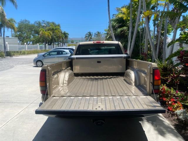 2005 Sand Beige Metallic /Neutral GMC Sierra 1500 LOW MILES 83837 AC NO ACCIDENTS (1GTEC14X15Z) with an 4.3L Vortec 4300 V6 MFI Engine engine, Automatic transmission, located at 4701 North Dixie Hwy, Pompano Beach, FL, 33064, (954) 422-2889, 26.240938, -80.123474 - OUR WEBPAGE FLORIDACARS1.COM HAS OVER 100 PHOTOS AND FREE CARFAX LINK 2005 GMC Sierra 1500 Pickup 4.3L V6 F Gasoline 22 MPG Rear Wheel Drive Features ABS Brakes Air Conditioning AM/FM Stereo Automatic Transmission CD Audio Cloth Seats Cruise Control Long Bed 2005 GMC Sierra Regular Cab Work Truck wi - Photo#86