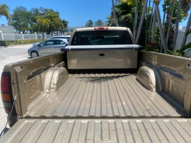 2005 Sand Beige Metallic /Neutral GMC Sierra 1500 LOW MILES 83837 AC NO ACCIDENTS (1GTEC14X15Z) with an 4.3L Vortec 4300 V6 MFI Engine engine, Automatic transmission, located at 4701 North Dixie Hwy, Pompano Beach, FL, 33064, (954) 422-2889, 26.240938, -80.123474 - OUR WEBPAGE FLORIDACARS1.COM HAS OVER 100 PHOTOS AND FREE CARFAX LINK 2005 GMC Sierra 1500 Pickup 4.3L V6 F Gasoline 22 MPG Rear Wheel Drive Features ABS Brakes Air Conditioning AM/FM Stereo Automatic Transmission CD Audio Cloth Seats Cruise Control Long Bed 2005 GMC Sierra Regular Cab Work Truck wi - Photo#87
