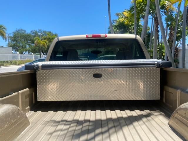 2005 Sand Beige Metallic /Neutral GMC Sierra 1500 LOW MILES 83837 AC NO ACCIDENTS (1GTEC14X15Z) with an 4.3L Vortec 4300 V6 MFI Engine engine, Automatic transmission, located at 4701 North Dixie Hwy, Pompano Beach, FL, 33064, (954) 422-2889, 26.240938, -80.123474 - OUR WEBPAGE FLORIDACARS1.COM HAS OVER 100 PHOTOS AND FREE CARFAX LINK 2005 GMC Sierra 1500 Pickup 4.3L V6 F Gasoline 22 MPG Rear Wheel Drive Features ABS Brakes Air Conditioning AM/FM Stereo Automatic Transmission CD Audio Cloth Seats Cruise Control Long Bed 2005 GMC Sierra Regular Cab Work Truck wi - Photo#90