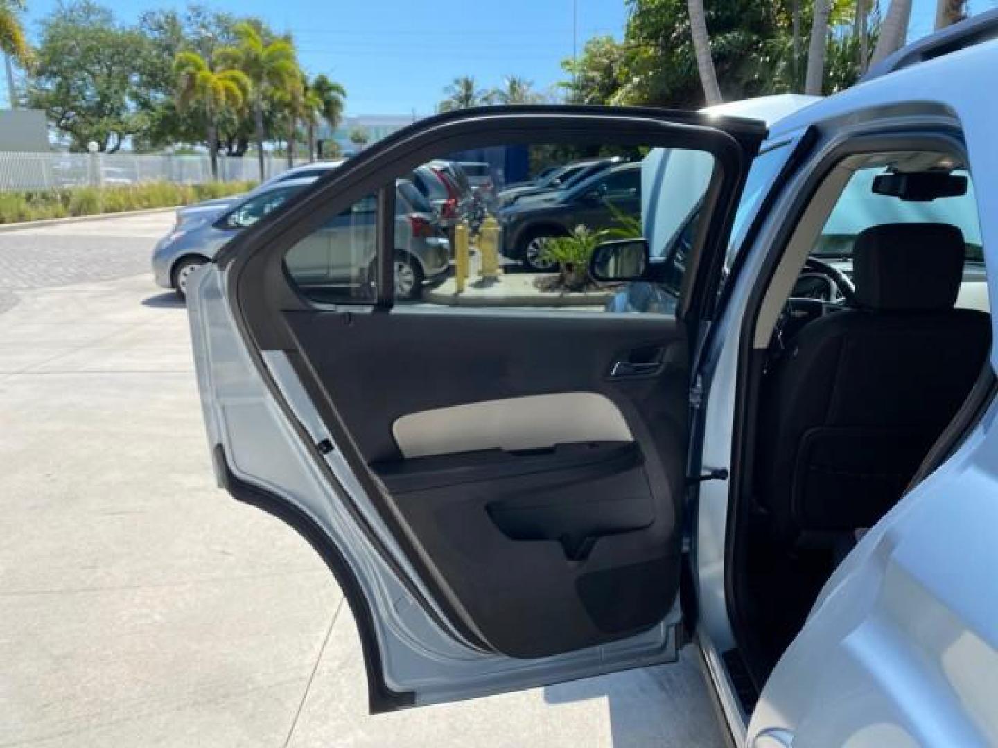 2014 Silver Topaz Metallic /Light Titanium/Jet Black Chevrolet Equinox SUV LT 1 OWNER LOW MILES 28,707 (2GNALCEK2E6) with an 2.4L DOHC 4-Cyl SIDI Spark Ignition DI Engine engine, Automatic transmission, located at 4701 North Dixie Hwy, Pompano Beach, FL, 33064, (954) 422-2889, 26.240938, -80.123474 - OUR WEBPAGE FLORIDACARS1.COM HAS OVER 100 PHOTOS AND FREE CARFAX LINK 2014 Chevrolet Equinox LT 1 OWNER 4 Door Wagon/Sport Utility 2.4L I4 F DOHC 16V Flex Fuel 32 MPG Front Wheel Drive Features ABS Brakes Air Conditioning Alloy Wheels AM/FM Stereo Automatic Transmission Auxiliary Audio Input Bluetoo- Photo#13