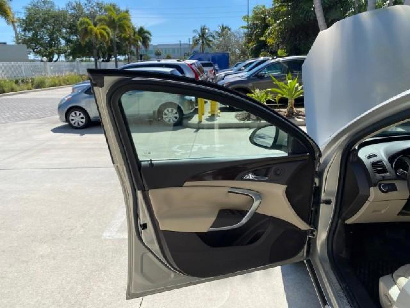 2011 Quicksilver Metallic /Cashmere Buick Regal SEDAN CXL LOW MILES 35,816 (W04GR5EC2B1) with an 2.4L Ecotec DOHC 4-Cyl SIDI Spark Ignition DI Engine engine, Automatic transmission, located at 4701 North Dixie Hwy, Pompano Beach, FL, 33064, (954) 422-2889, 26.240938, -80.123474 - OUR WEBPAGE FLORIDACARS1.COM HAS OVER 100 PHOTOS AND FREE CARFAX LINK 2011 Buick Regal CXL Sedan 4 DR 2.4L I4 F DOHC 16V Gasoline 30 MPG Front Wheel Drive Features ABS Brakes Air Conditioning Alloy Wheels AM/FM Stereo Automatic Transmission Auxiliary Audio Input Bluetooth Technology CD Audio Comfort- Photo#9