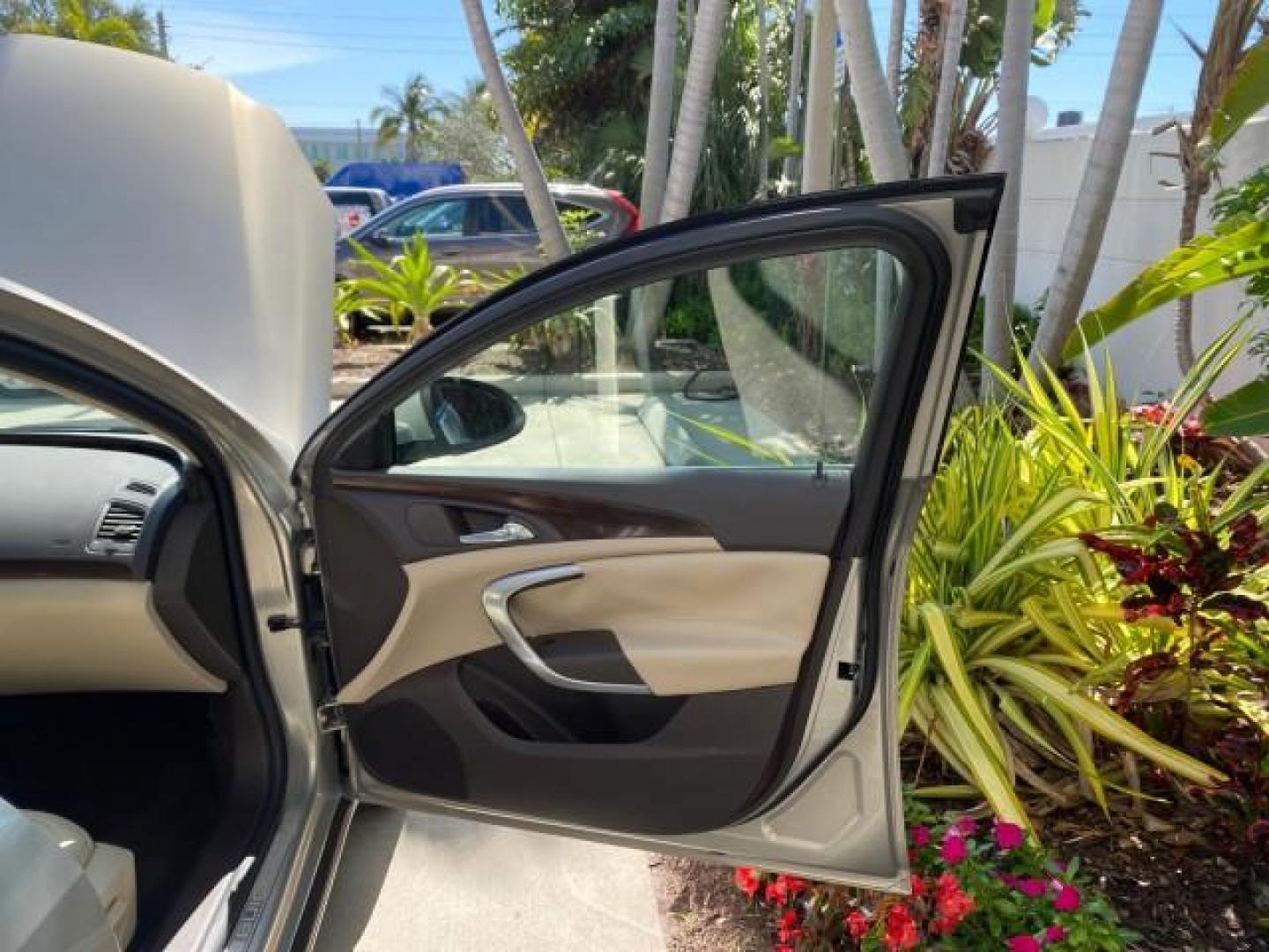 2011 Quicksilver Metallic /Cashmere Buick Regal SEDAN CXL LOW MILES 35,816 (W04GR5EC2B1) with an 2.4L Ecotec DOHC 4-Cyl SIDI Spark Ignition DI Engine engine, Automatic transmission, located at 4701 North Dixie Hwy, Pompano Beach, FL, 33064, (954) 422-2889, 26.240938, -80.123474 - OUR WEBPAGE FLORIDACARS1.COM HAS OVER 100 PHOTOS AND FREE CARFAX LINK 2011 Buick Regal CXL Sedan 4 DR 2.4L I4 F DOHC 16V Gasoline 30 MPG Front Wheel Drive Features ABS Brakes Air Conditioning Alloy Wheels AM/FM Stereo Automatic Transmission Auxiliary Audio Input Bluetooth Technology CD Audio Comfort- Photo#11