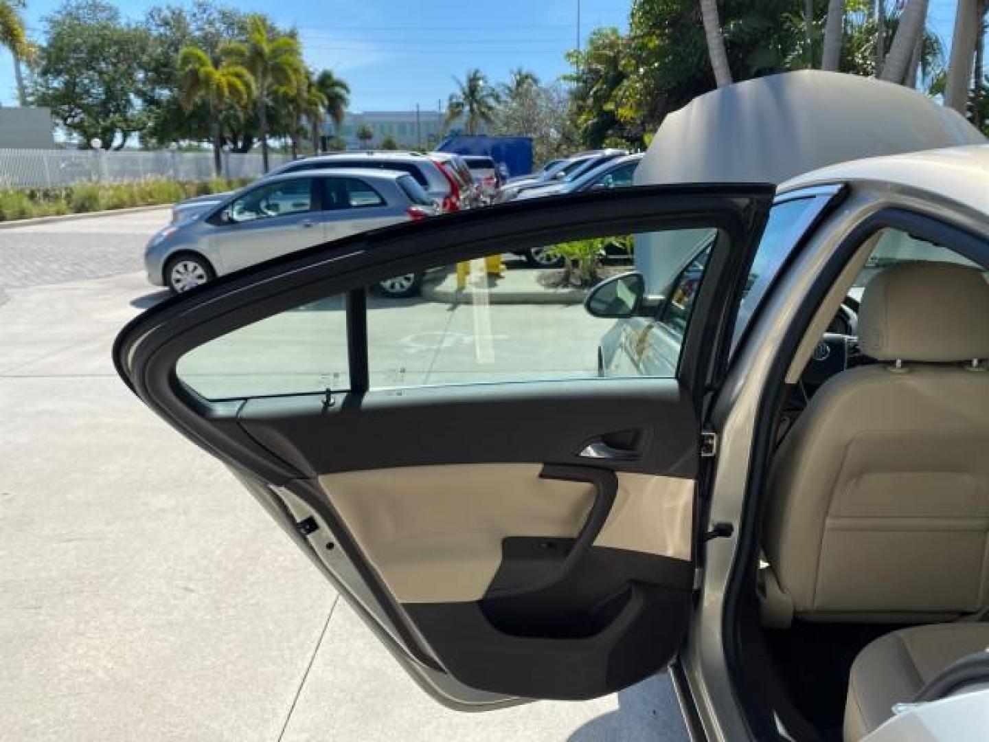 2011 Quicksilver Metallic /Cashmere Buick Regal SEDAN CXL LOW MILES 35,816 (W04GR5EC2B1) with an 2.4L Ecotec DOHC 4-Cyl SIDI Spark Ignition DI Engine engine, Automatic transmission, located at 4701 North Dixie Hwy, Pompano Beach, FL, 33064, (954) 422-2889, 26.240938, -80.123474 - OUR WEBPAGE FLORIDACARS1.COM HAS OVER 100 PHOTOS AND FREE CARFAX LINK 2011 Buick Regal CXL Sedan 4 DR 2.4L I4 F DOHC 16V Gasoline 30 MPG Front Wheel Drive Features ABS Brakes Air Conditioning Alloy Wheels AM/FM Stereo Automatic Transmission Auxiliary Audio Input Bluetooth Technology CD Audio Comfort- Photo#13