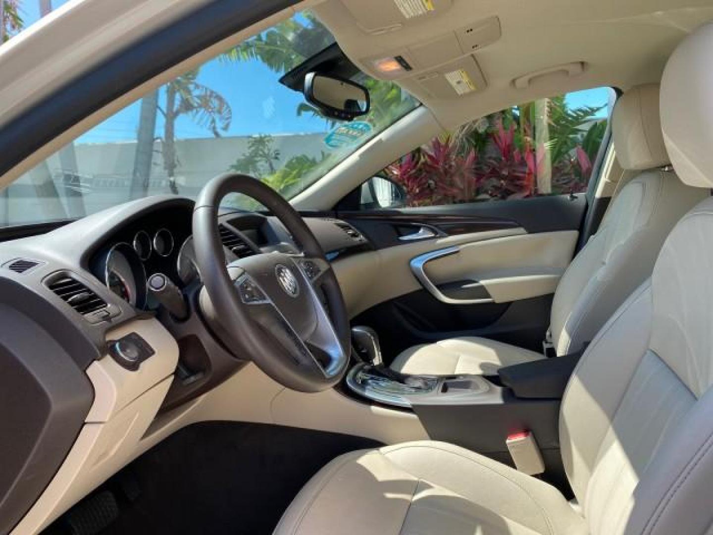 2011 Quicksilver Metallic /Cashmere Buick Regal SEDAN CXL LOW MILES 35,816 (W04GR5EC2B1) with an 2.4L Ecotec DOHC 4-Cyl SIDI Spark Ignition DI Engine engine, Automatic transmission, located at 4701 North Dixie Hwy, Pompano Beach, FL, 33064, (954) 422-2889, 26.240938, -80.123474 - OUR WEBPAGE FLORIDACARS1.COM HAS OVER 100 PHOTOS AND FREE CARFAX LINK 2011 Buick Regal CXL Sedan 4 DR 2.4L I4 F DOHC 16V Gasoline 30 MPG Front Wheel Drive Features ABS Brakes Air Conditioning Alloy Wheels AM/FM Stereo Automatic Transmission Auxiliary Audio Input Bluetooth Technology CD Audio Comfort- Photo#46