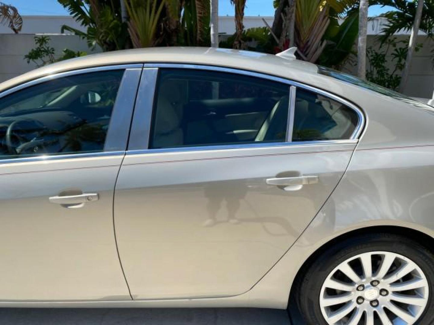 2011 Quicksilver Metallic /Cashmere Buick Regal SEDAN CXL LOW MILES 35,816 (W04GR5EC2B1) with an 2.4L Ecotec DOHC 4-Cyl SIDI Spark Ignition DI Engine engine, Automatic transmission, located at 4701 North Dixie Hwy, Pompano Beach, FL, 33064, (954) 422-2889, 26.240938, -80.123474 - OUR WEBPAGE FLORIDACARS1.COM HAS OVER 100 PHOTOS AND FREE CARFAX LINK 2011 Buick Regal CXL Sedan 4 DR 2.4L I4 F DOHC 16V Gasoline 30 MPG Front Wheel Drive Features ABS Brakes Air Conditioning Alloy Wheels AM/FM Stereo Automatic Transmission Auxiliary Audio Input Bluetooth Technology CD Audio Comfort- Photo#73