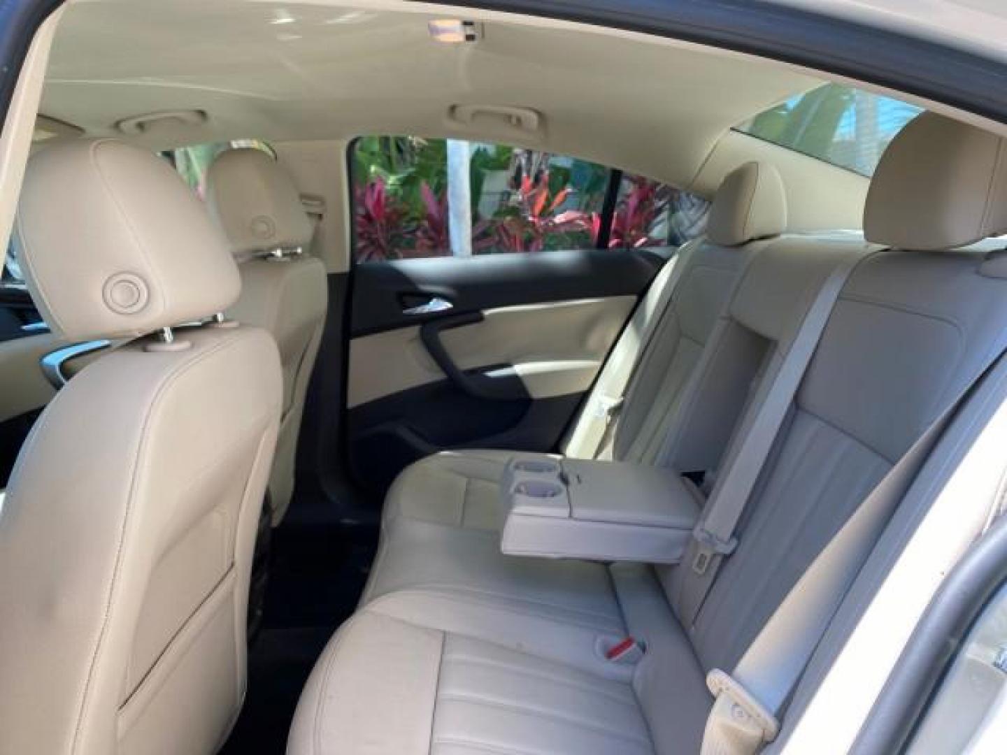 2011 Quicksilver Metallic /Cashmere Buick Regal SEDAN CXL LOW MILES 35,816 (W04GR5EC2B1) with an 2.4L Ecotec DOHC 4-Cyl SIDI Spark Ignition DI Engine engine, Automatic transmission, located at 4701 North Dixie Hwy, Pompano Beach, FL, 33064, (954) 422-2889, 26.240938, -80.123474 - OUR WEBPAGE FLORIDACARS1.COM HAS OVER 100 PHOTOS AND FREE CARFAX LINK 2011 Buick Regal CXL Sedan 4 DR 2.4L I4 F DOHC 16V Gasoline 30 MPG Front Wheel Drive Features ABS Brakes Air Conditioning Alloy Wheels AM/FM Stereo Automatic Transmission Auxiliary Audio Input Bluetooth Technology CD Audio Comfort- Photo#76