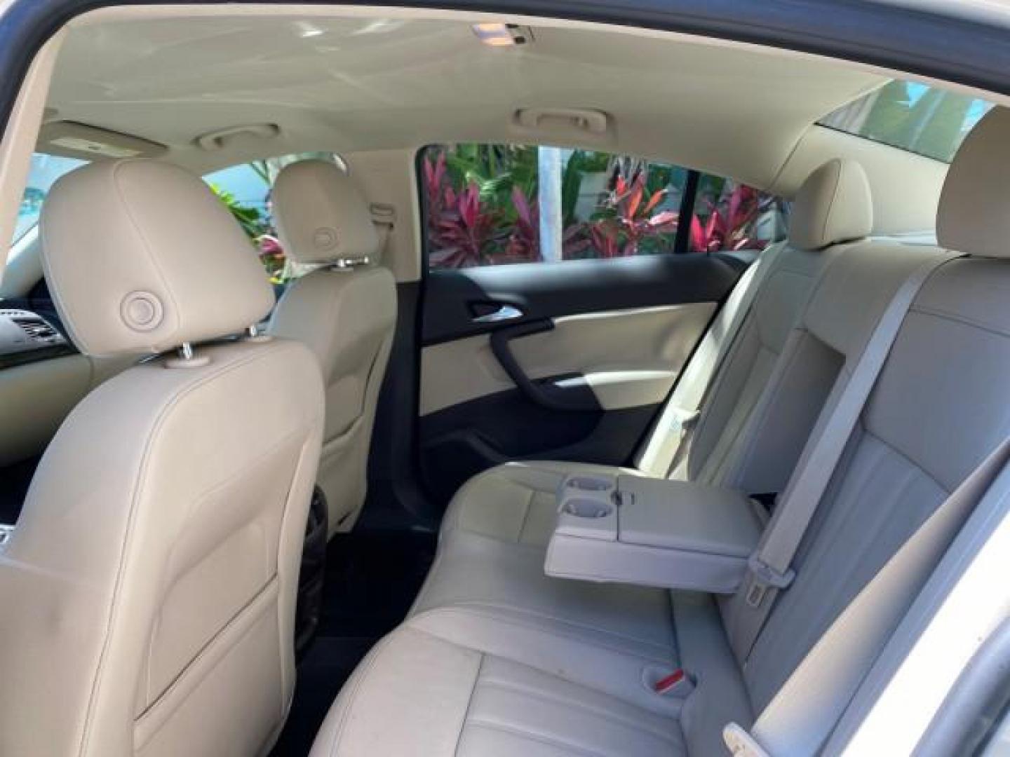2011 Quicksilver Metallic /Cashmere Buick Regal SEDAN CXL LOW MILES 35,816 (W04GR5EC2B1) with an 2.4L Ecotec DOHC 4-Cyl SIDI Spark Ignition DI Engine engine, Automatic transmission, located at 4701 North Dixie Hwy, Pompano Beach, FL, 33064, (954) 422-2889, 26.240938, -80.123474 - OUR WEBPAGE FLORIDACARS1.COM HAS OVER 100 PHOTOS AND FREE CARFAX LINK 2011 Buick Regal CXL Sedan 4 DR 2.4L I4 F DOHC 16V Gasoline 30 MPG Front Wheel Drive Features ABS Brakes Air Conditioning Alloy Wheels AM/FM Stereo Automatic Transmission Auxiliary Audio Input Bluetooth Technology CD Audio Comfort- Photo#77