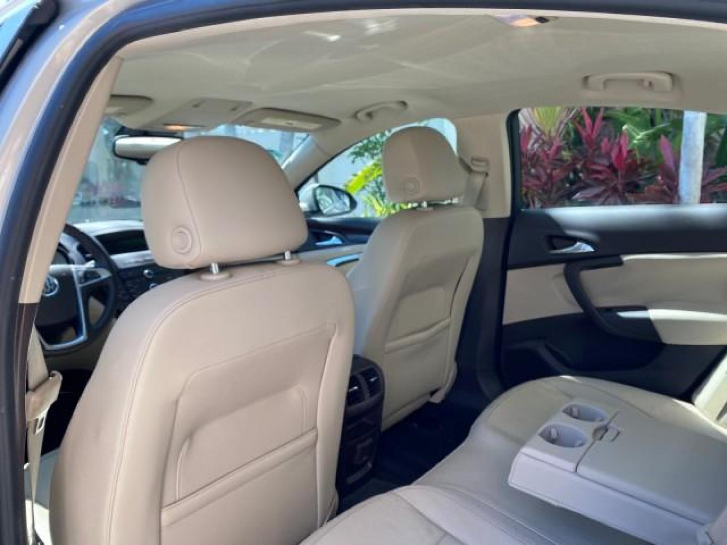 2011 Quicksilver Metallic /Cashmere Buick Regal SEDAN CXL LOW MILES 35,816 (W04GR5EC2B1) with an 2.4L Ecotec DOHC 4-Cyl SIDI Spark Ignition DI Engine engine, Automatic transmission, located at 4701 North Dixie Hwy, Pompano Beach, FL, 33064, (954) 422-2889, 26.240938, -80.123474 - OUR WEBPAGE FLORIDACARS1.COM HAS OVER 100 PHOTOS AND FREE CARFAX LINK 2011 Buick Regal CXL Sedan 4 DR 2.4L I4 F DOHC 16V Gasoline 30 MPG Front Wheel Drive Features ABS Brakes Air Conditioning Alloy Wheels AM/FM Stereo Automatic Transmission Auxiliary Audio Input Bluetooth Technology CD Audio Comfort- Photo#79