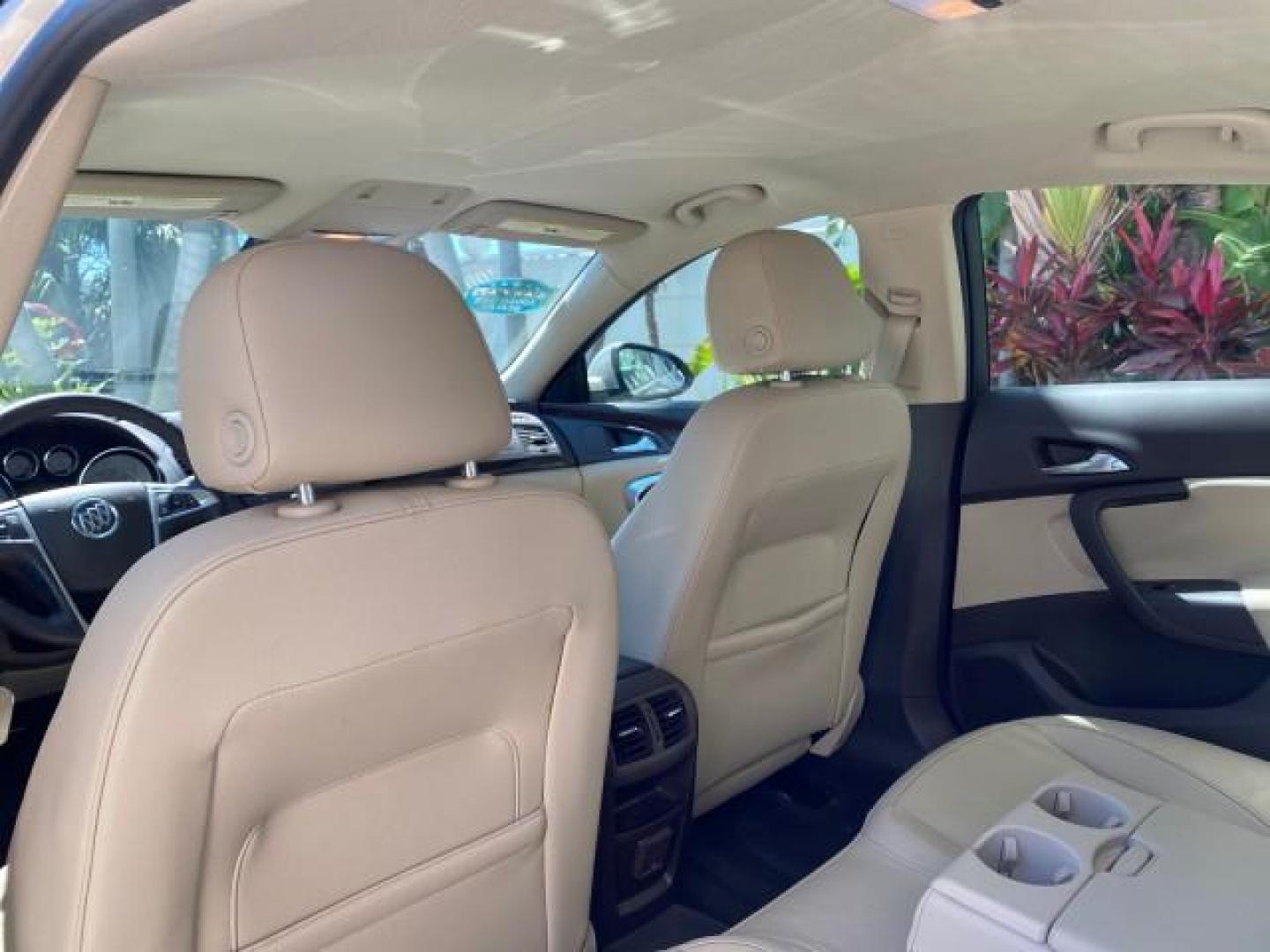 2011 Quicksilver Metallic /Cashmere Buick Regal SEDAN CXL LOW MILES 35,816 (W04GR5EC2B1) with an 2.4L Ecotec DOHC 4-Cyl SIDI Spark Ignition DI Engine engine, Automatic transmission, located at 4701 North Dixie Hwy, Pompano Beach, FL, 33064, (954) 422-2889, 26.240938, -80.123474 - OUR WEBPAGE FLORIDACARS1.COM HAS OVER 100 PHOTOS AND FREE CARFAX LINK 2011 Buick Regal CXL Sedan 4 DR 2.4L I4 F DOHC 16V Gasoline 30 MPG Front Wheel Drive Features ABS Brakes Air Conditioning Alloy Wheels AM/FM Stereo Automatic Transmission Auxiliary Audio Input Bluetooth Technology CD Audio Comfort- Photo#80